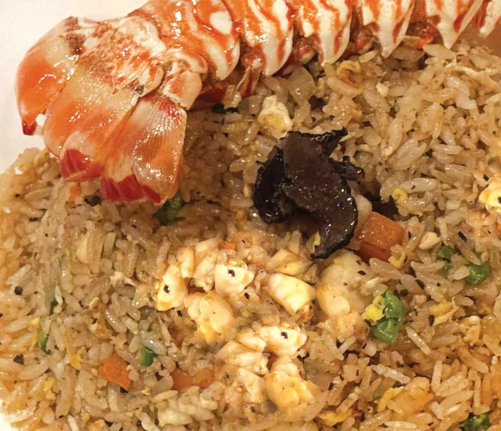 Black truffle lobster fried rice topped w/a lobster tail and shaved black truffle
